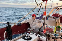 yacht-delivery-crew-on-watch-scaled